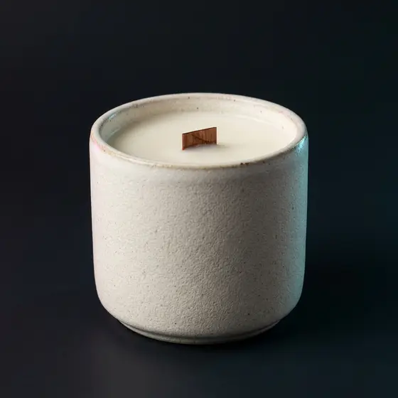 Cream ceramic scented candle in a jar